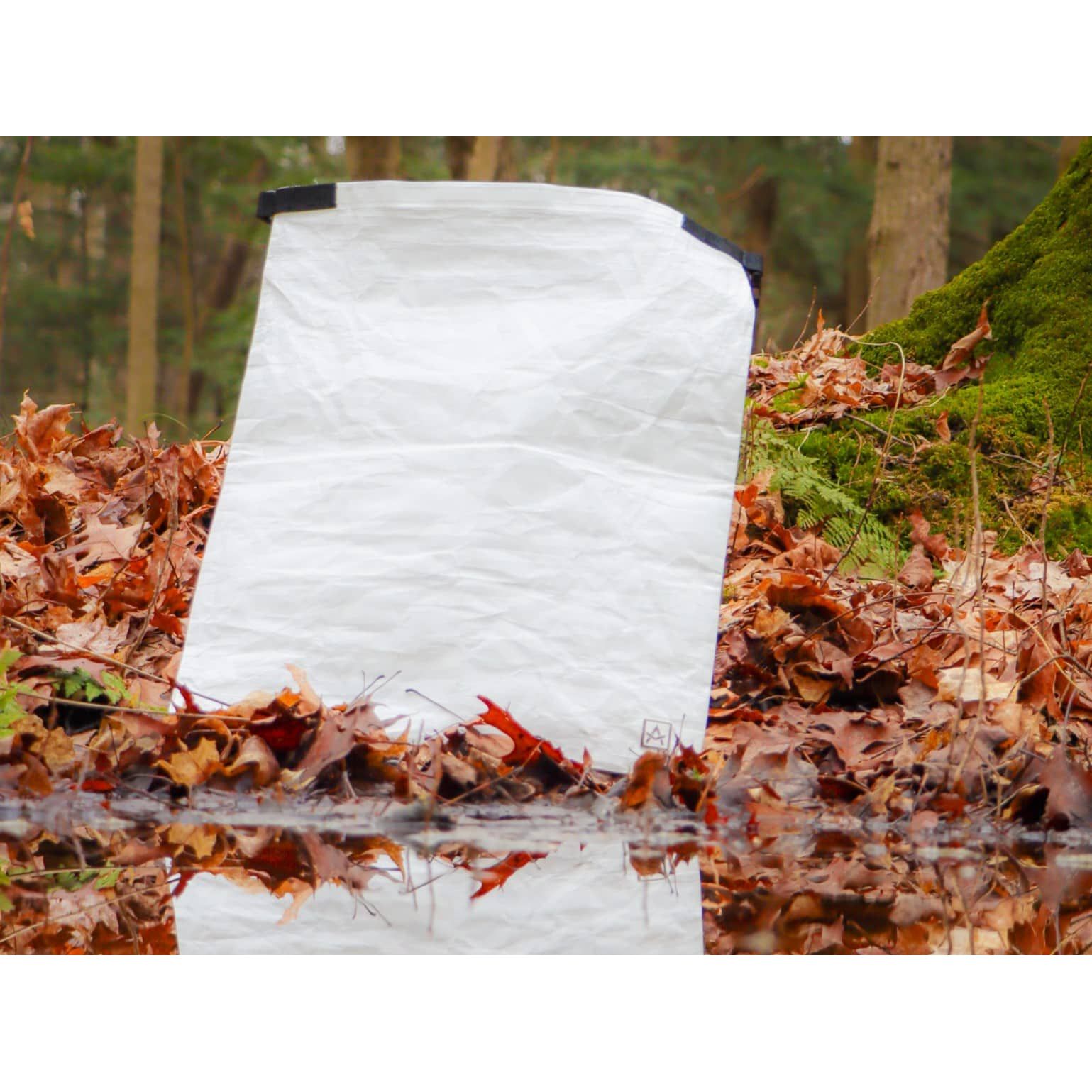 Ultralight Bear Locker 1 Adotec Gear Ultralight food storage for camping in a natural outdoor setting among autumn leaves